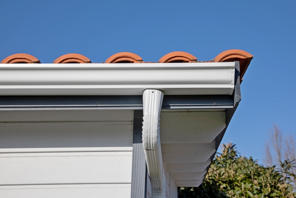 Roof,House,White,Aluminum,Gutter,On,New,Tiled,Roof,Home